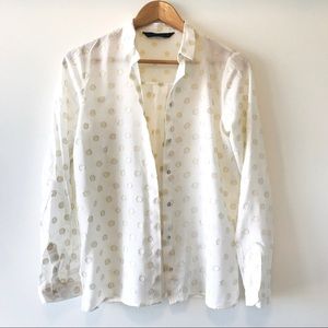 Blouse with golden polka dots